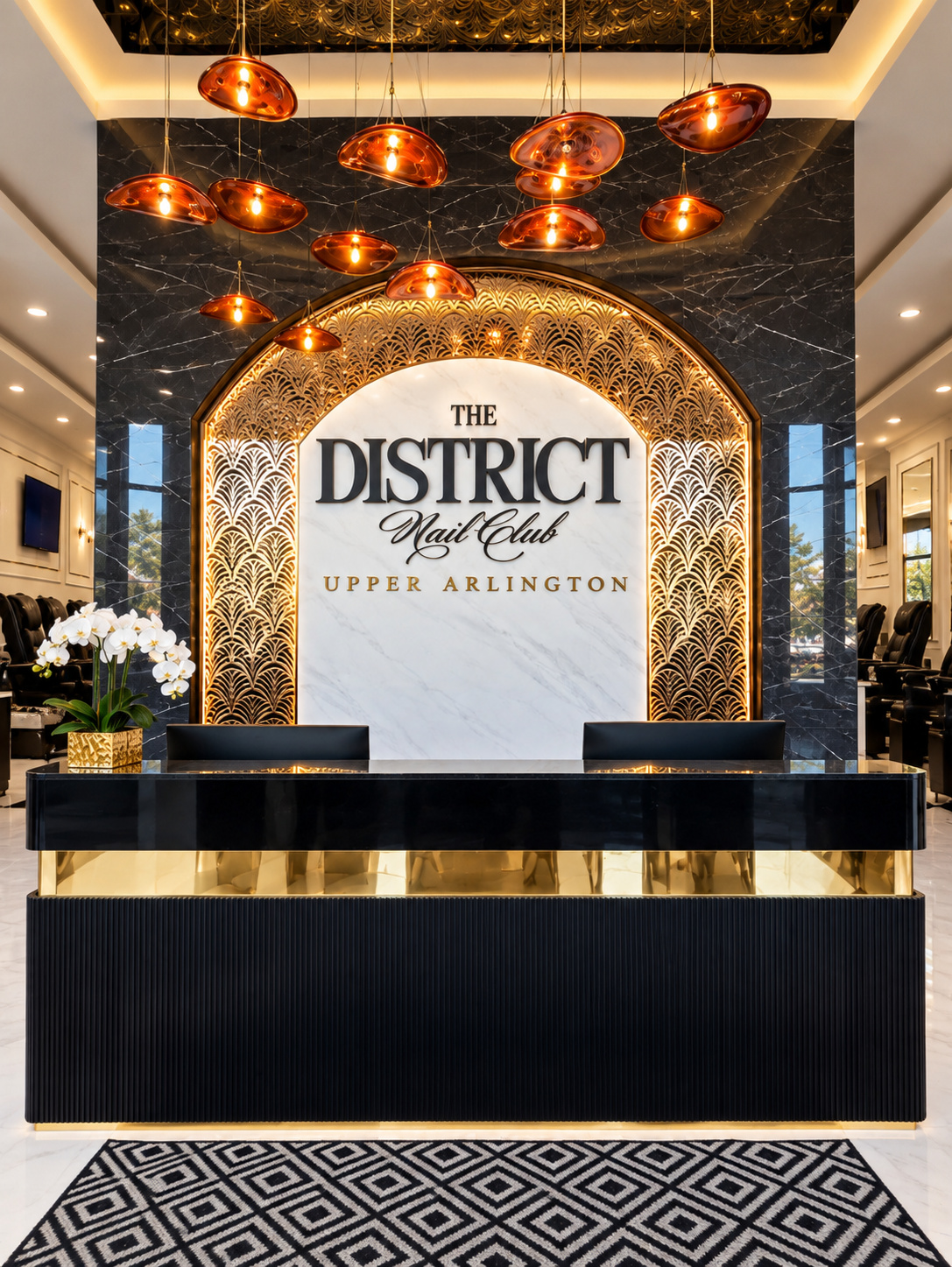 Interior design preview of the District Nail Club Upper Arlington reception with marble logo wall
